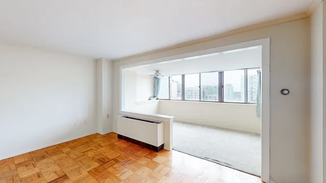 a view of an empty room with a window