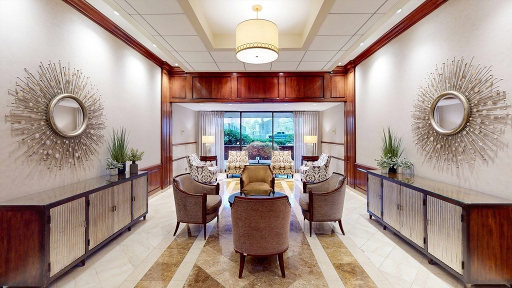 9 Hawthorne Place, Unit 11B Boston, MA 02114 - Photo 16 of 19 a living room with furniture and a large window
