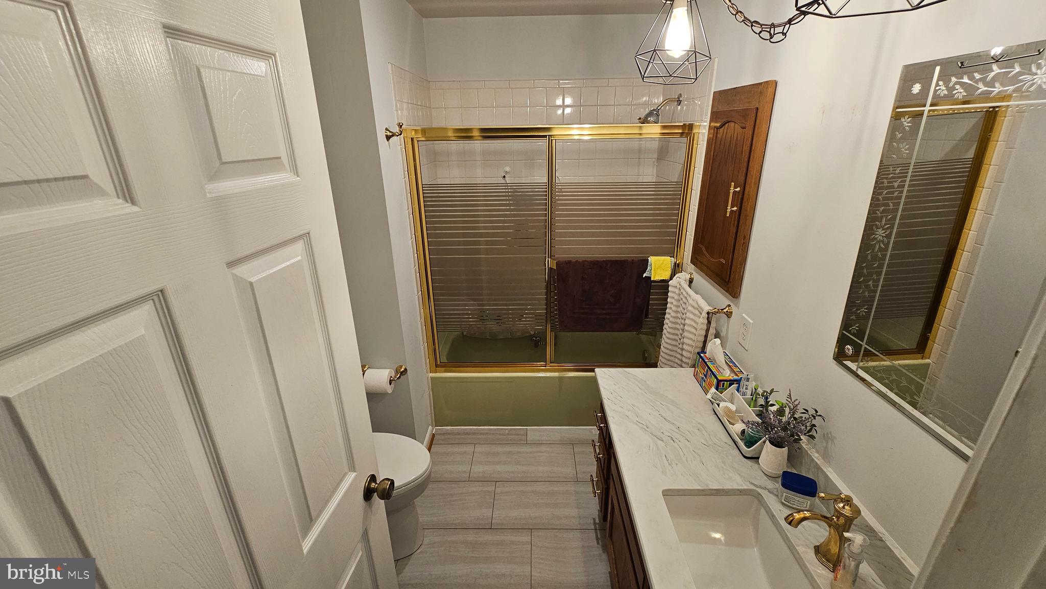 10921 Dumbarton Drive Dunkirk, MD 20754 - Photo 13 of 20 a bathroom with a shower