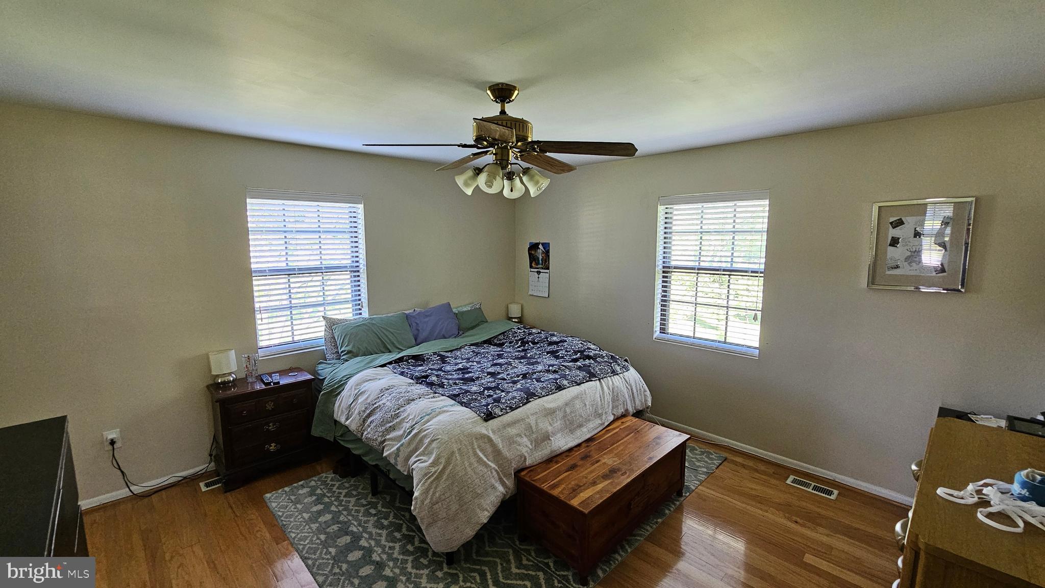 10921 Dumbarton Drive Dunkirk, MD 20754 - Photo 9 of 20 a bedroom with a bed and a chandelier
