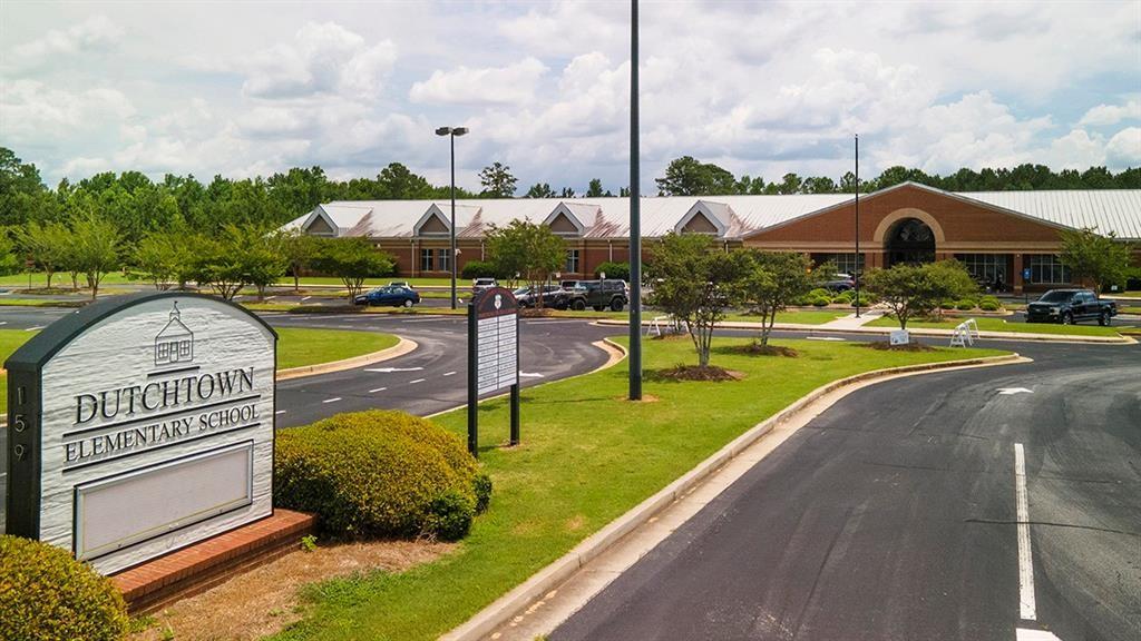 113 Canal Street Hampton, GA 30228 - Photo 33 of 33 a view of a swimming pool with a garden
