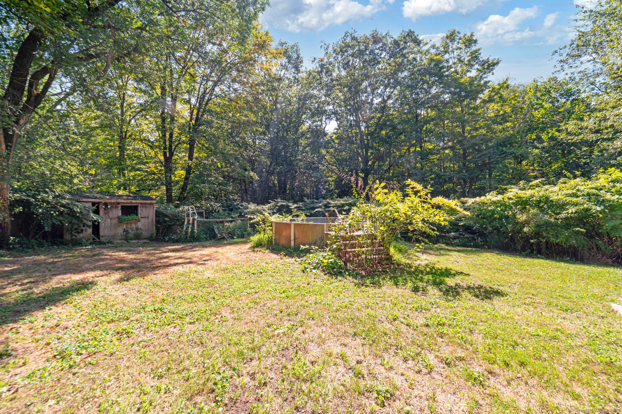28 Trumbull Street Litchfield, CT 06750 - Photo 6 of 23 a view of a swimming pool with a patio