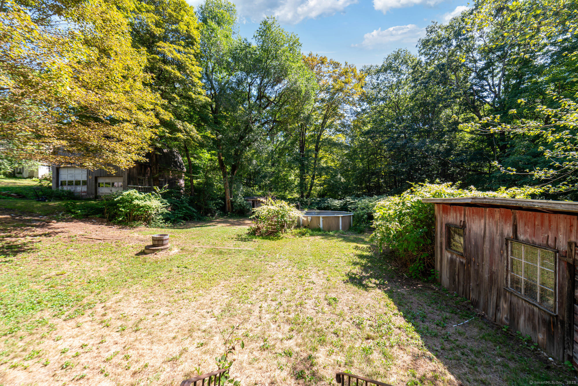28 Trumbull Street Litchfield, CT 06750 - Photo 7 of 23 a view of backyard with swimming pool and trees
