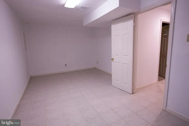 an empty room with closet