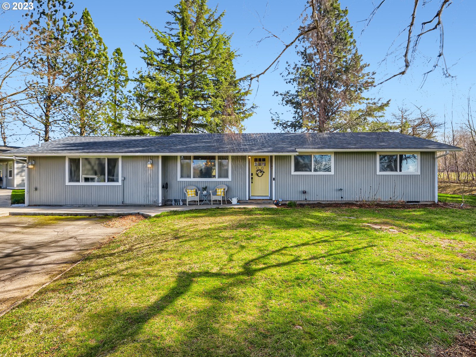 1830 Southeast Christensen Road Corbett, OR 97019 - Photo 1 of 28 a view of a house with a swimming pool