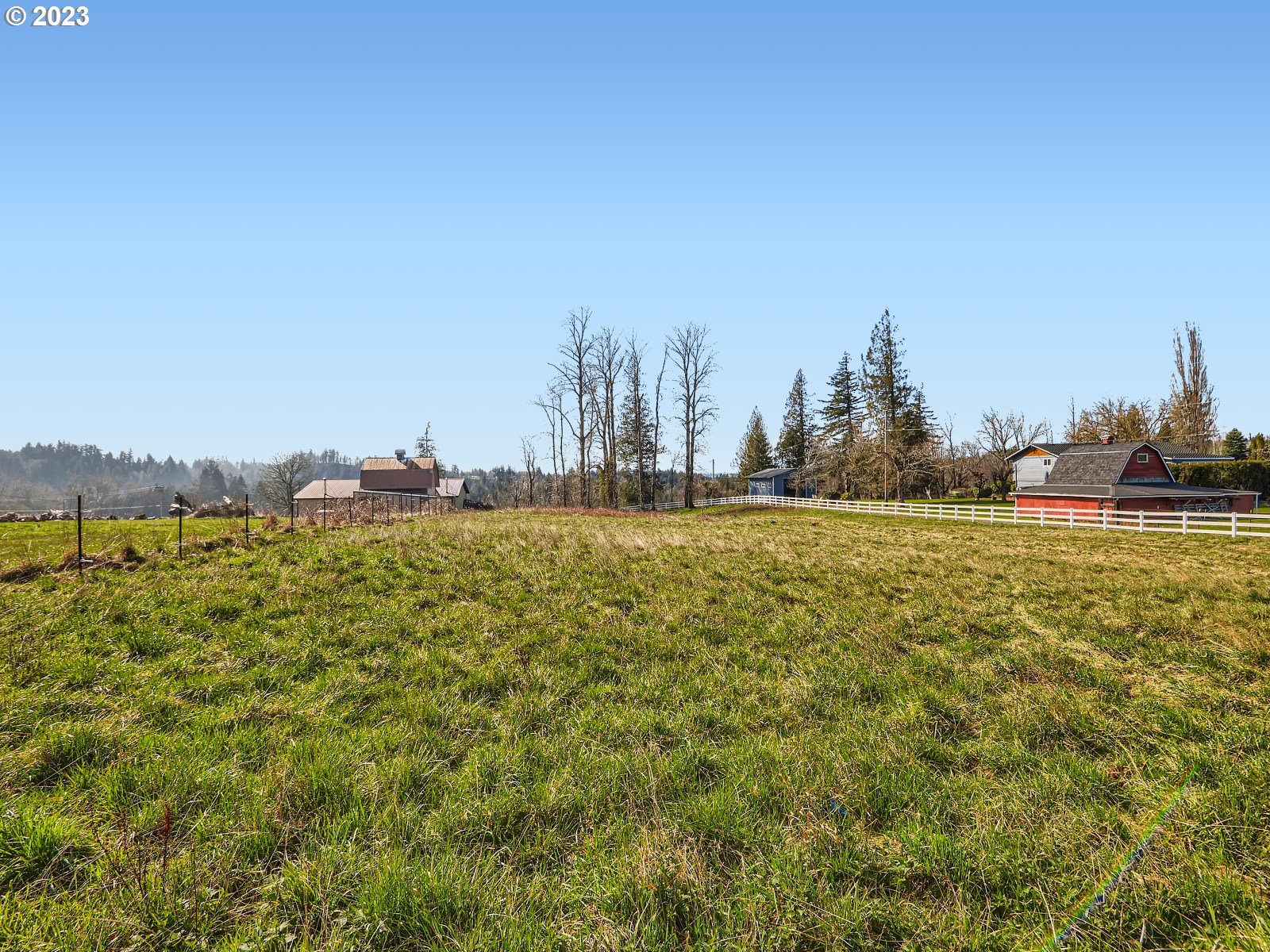 1830 Southeast Christensen Road Corbett, OR 97019 - Photo 20 of 28 a view of a large body of water with a building in the background
