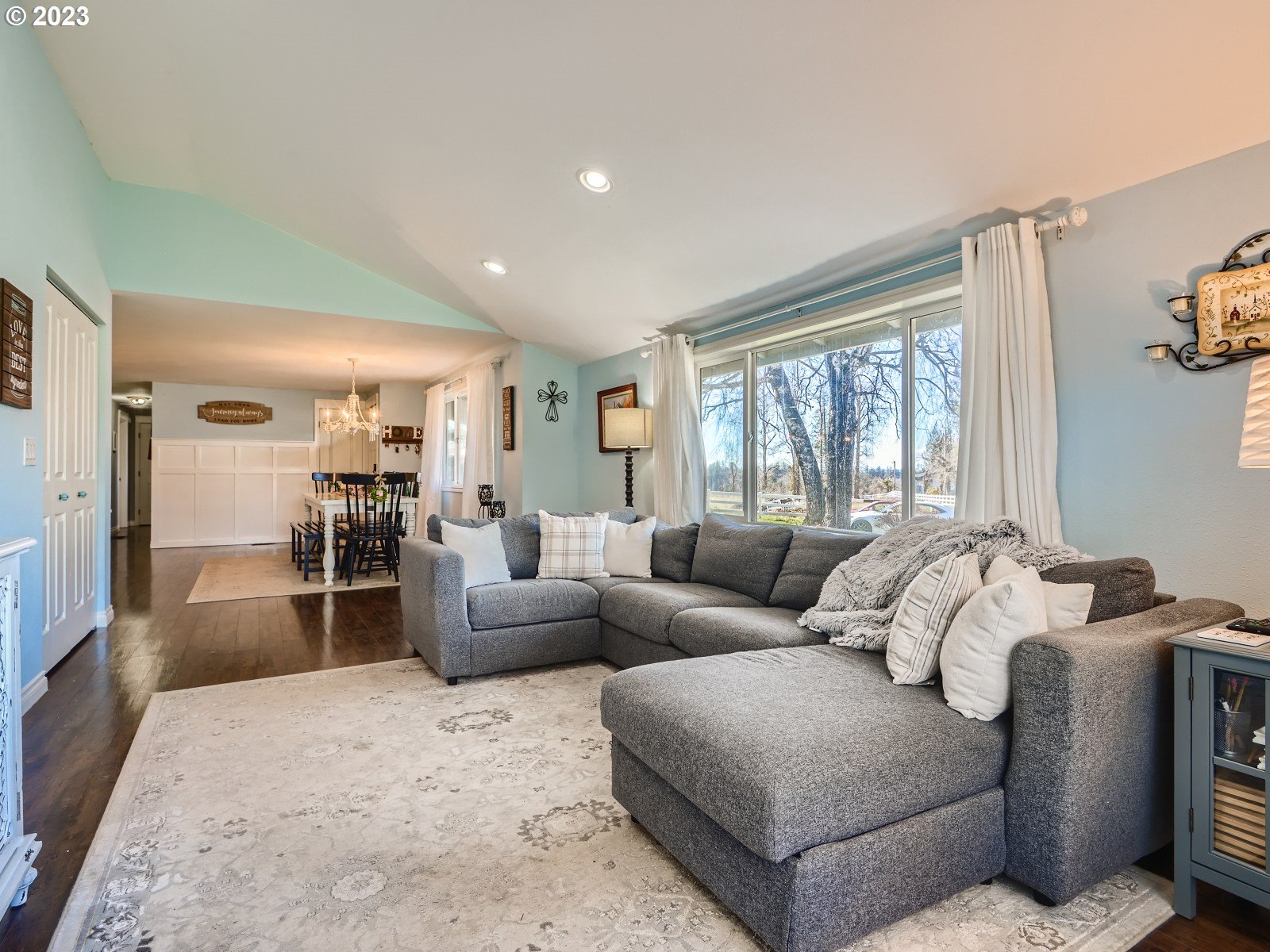 1830 Southeast Christensen Road Corbett, OR 97019 - Photo 2 of 28 a living room with furniture and a large window