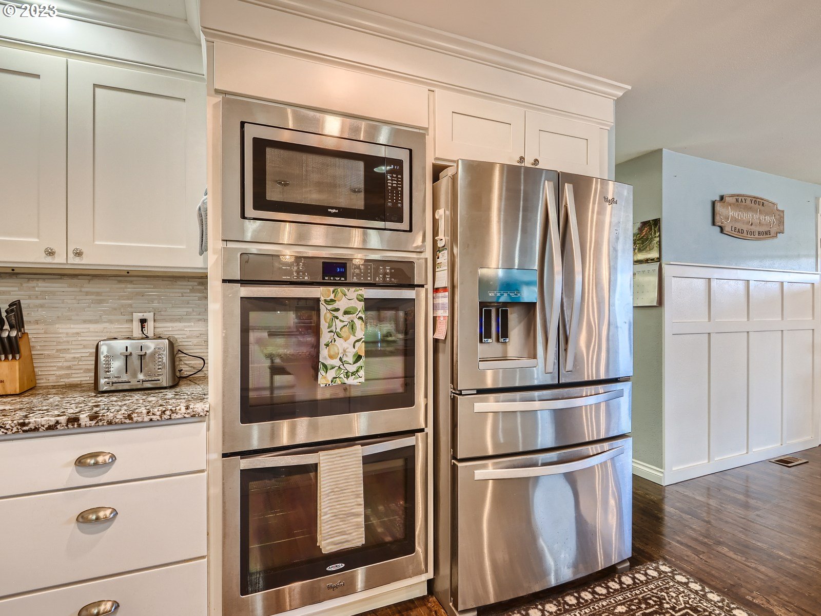 1830 Southeast Christensen Road Corbett, OR 97019 - Photo 8 of 28 a kitchen with stainless steel appliances and cabinets
