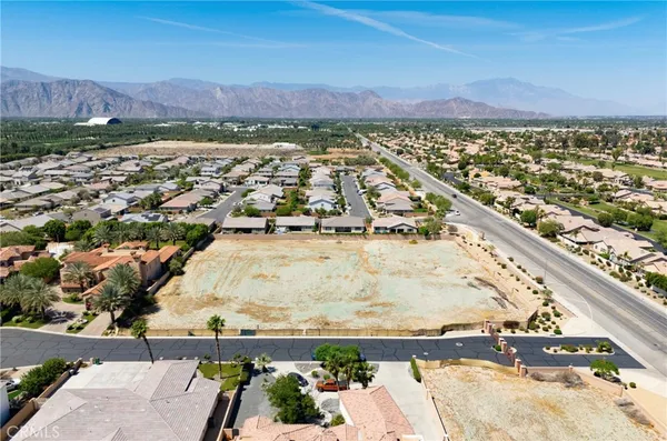 an aerial view of residential building and city view