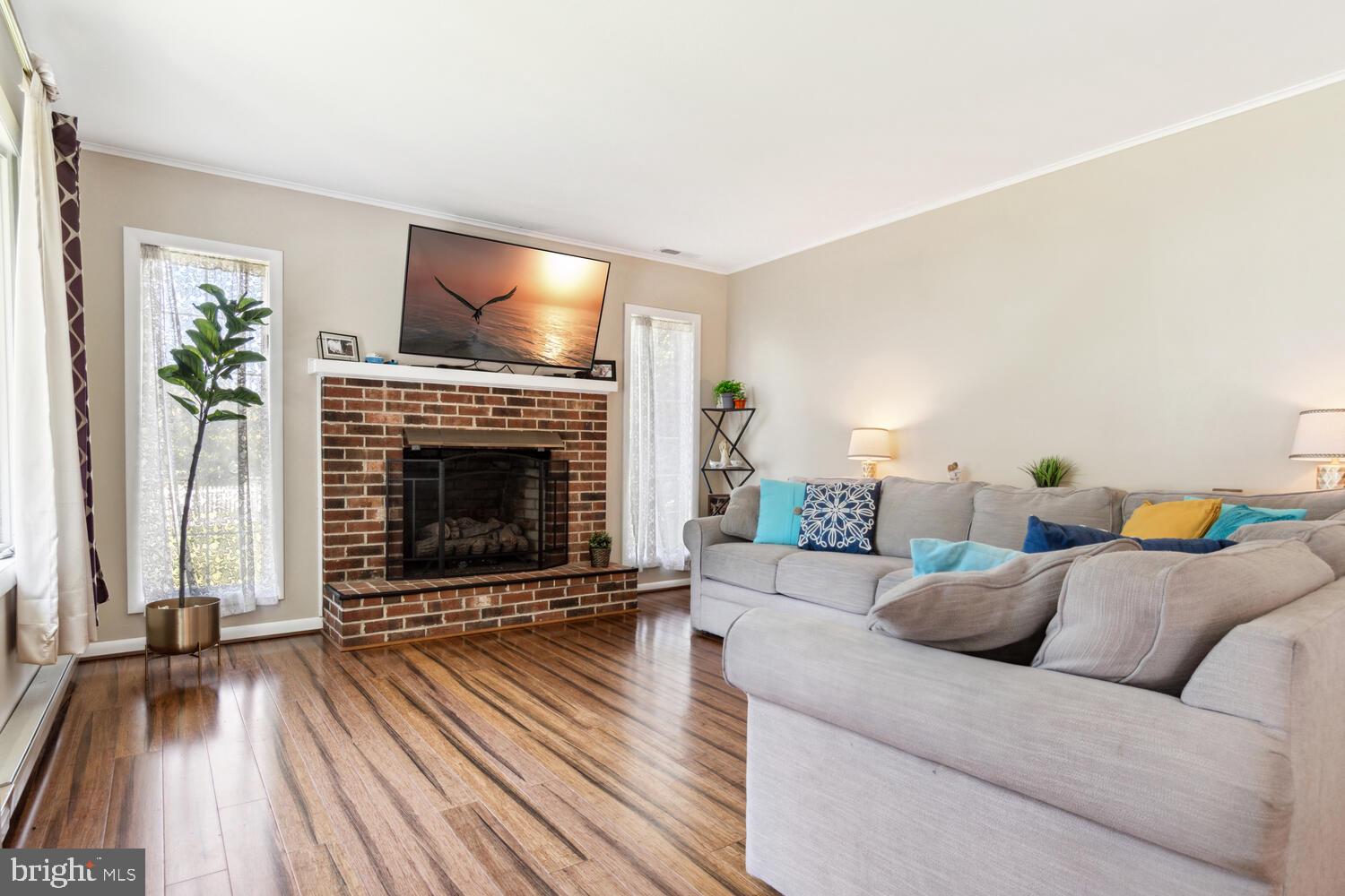 312 Pigpen Point Road Queenstown, MD 21658 - Photo 2 of 33 Cozy Living Room w/ Fireplace