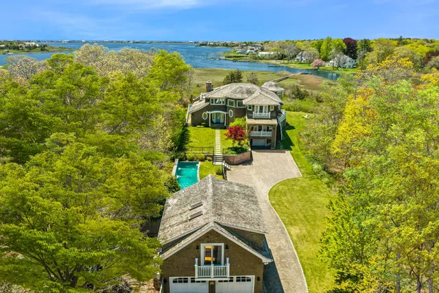 a view of a swimming pool with a lake view