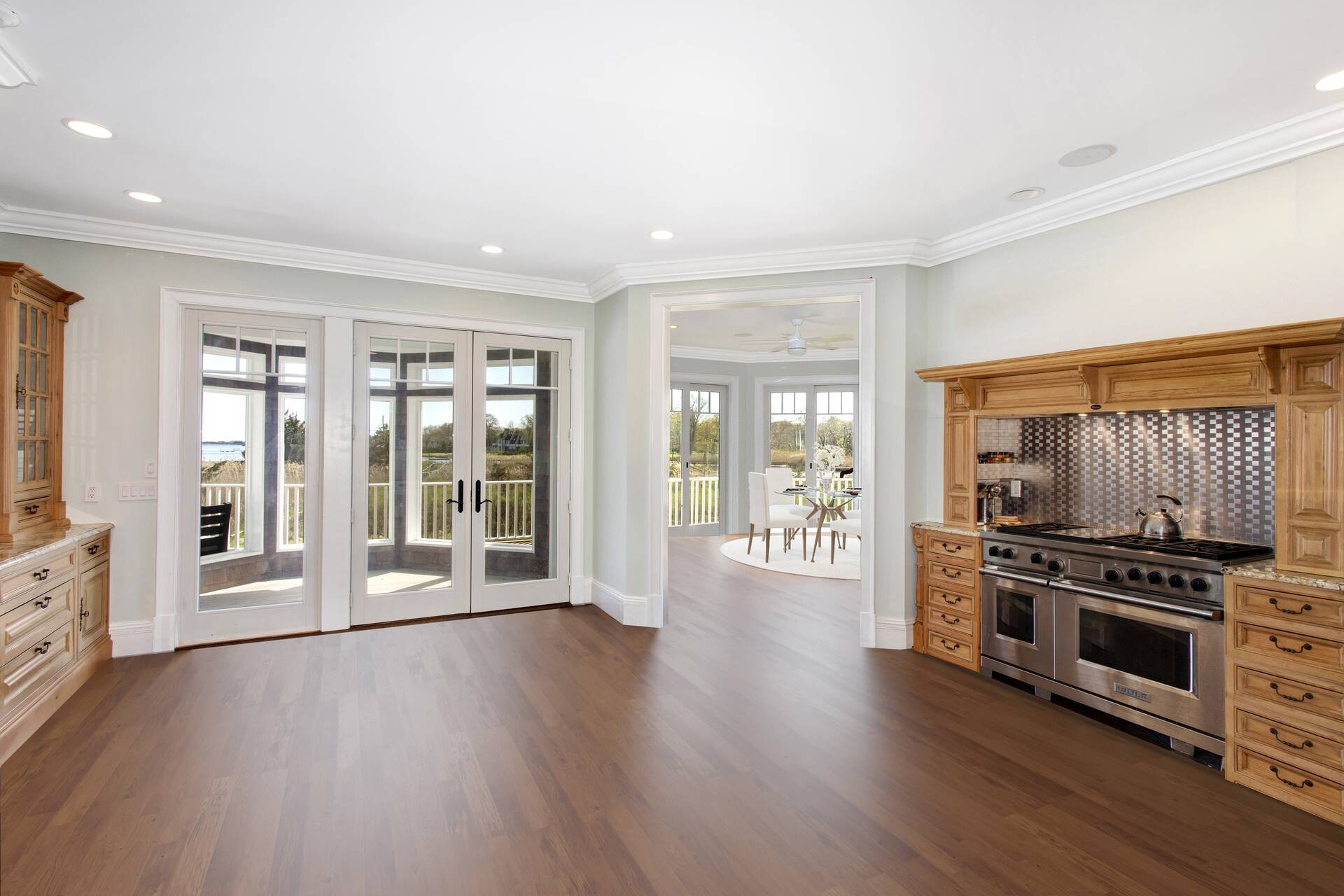 Undisclosed Address Westhampton Beach, NY 11978 - Photo 12 of 16 a view of kitchen with furniture wooden floor and window