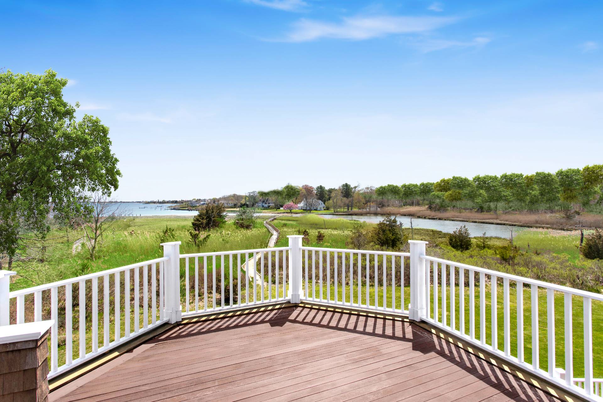 Undisclosed Address Westhampton Beach, NY 11978 - Photo 13 of 16 a view of a wooden deck with mountain view