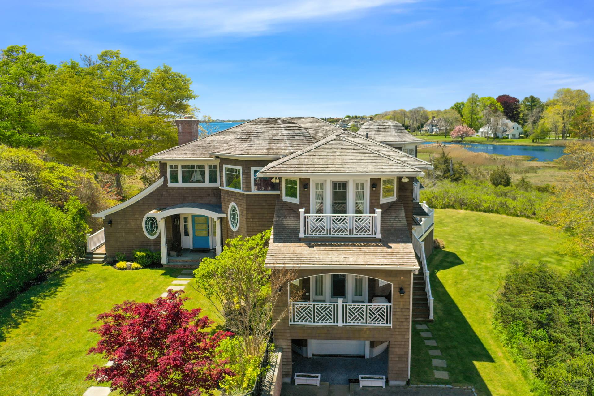 Undisclosed Address Westhampton Beach, NY 11978 - Photo 4 of 16 a front view of a house with a yard