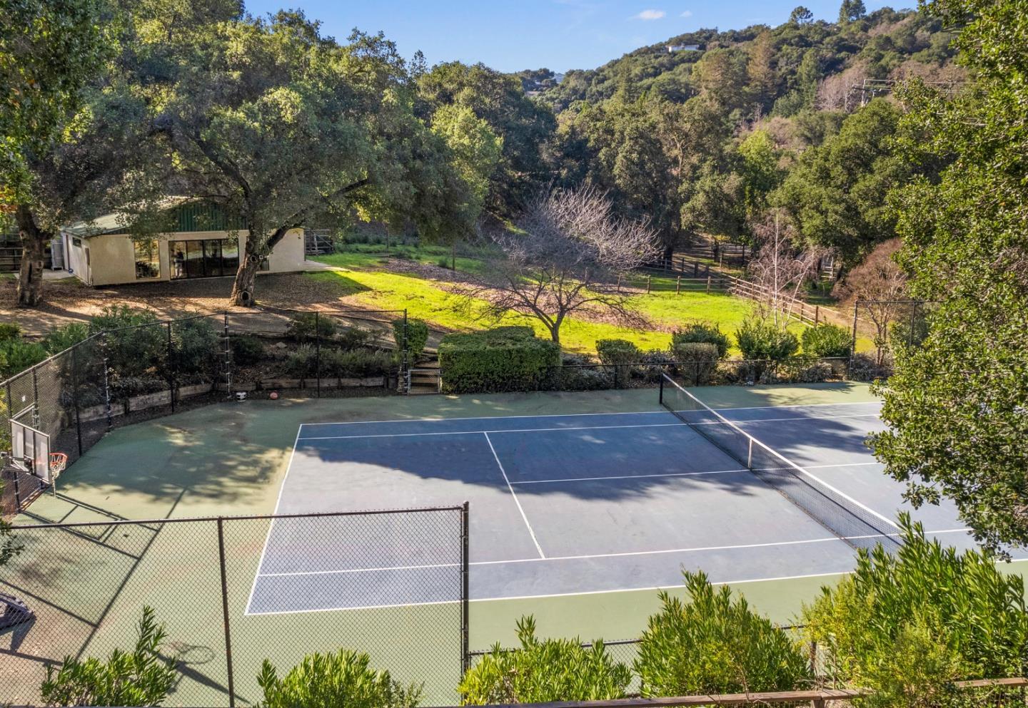 13398 Pierce Road Saratoga, CA 95070 - Photo 2 of 19 a view of swimming pool with lawn chairs and plants