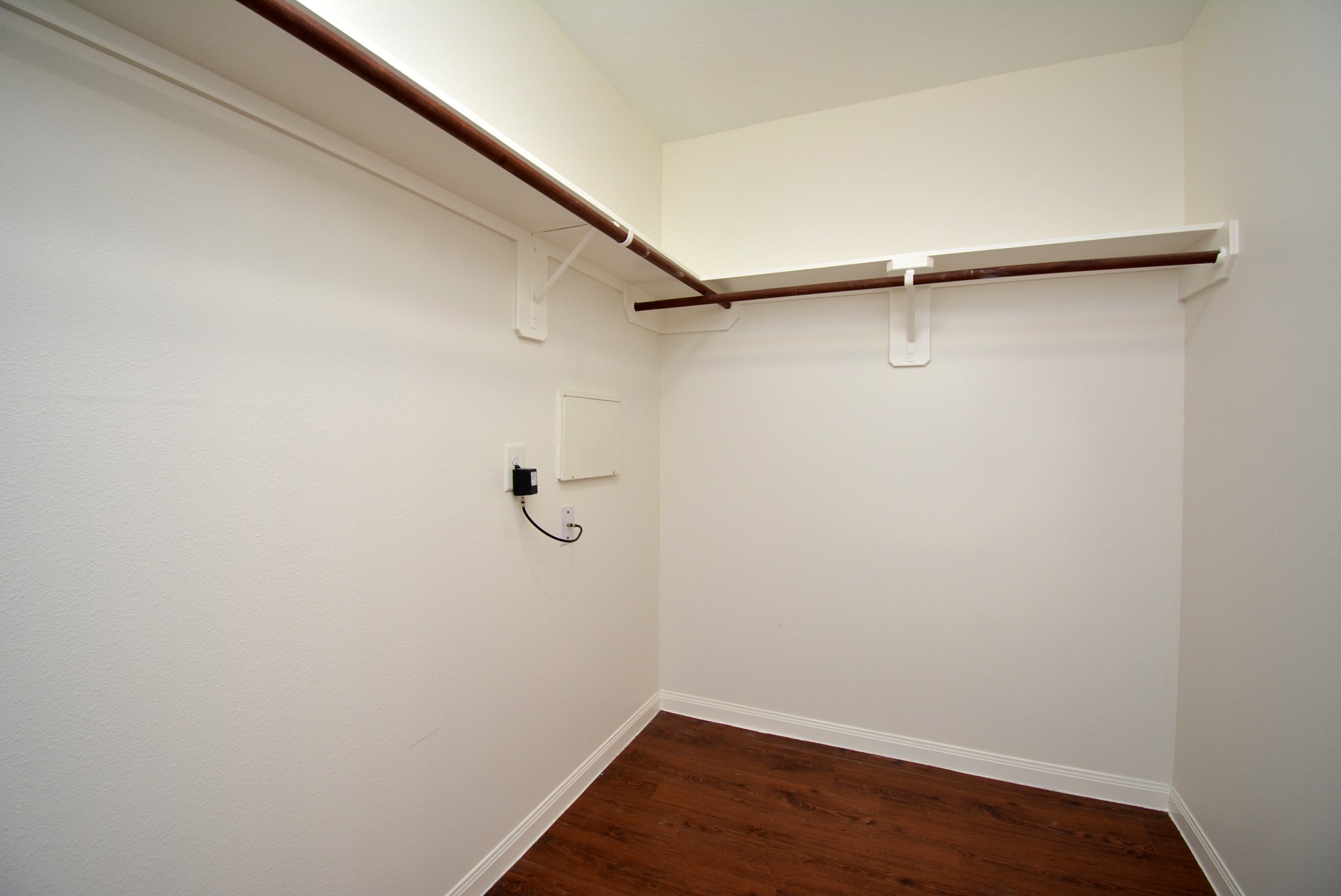 12010 Gregory Crossing Way Houston, TX 77067 - Photo 16 of 26 a view of a room with racks on the wall