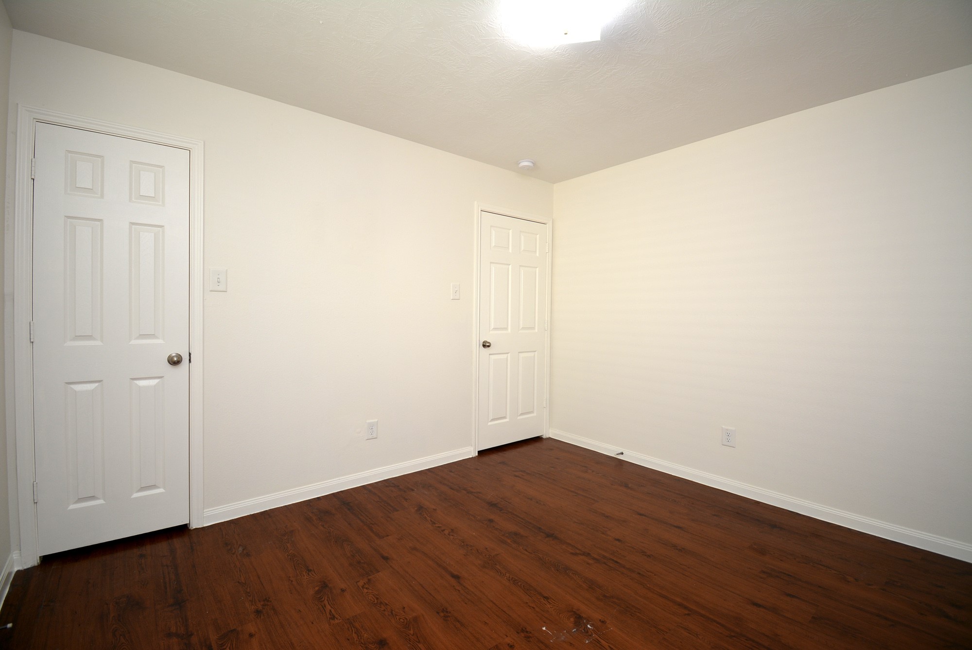 12010 Gregory Crossing Way Houston, TX 77067 - Photo 22 of 26 a view of small space with wooden floor