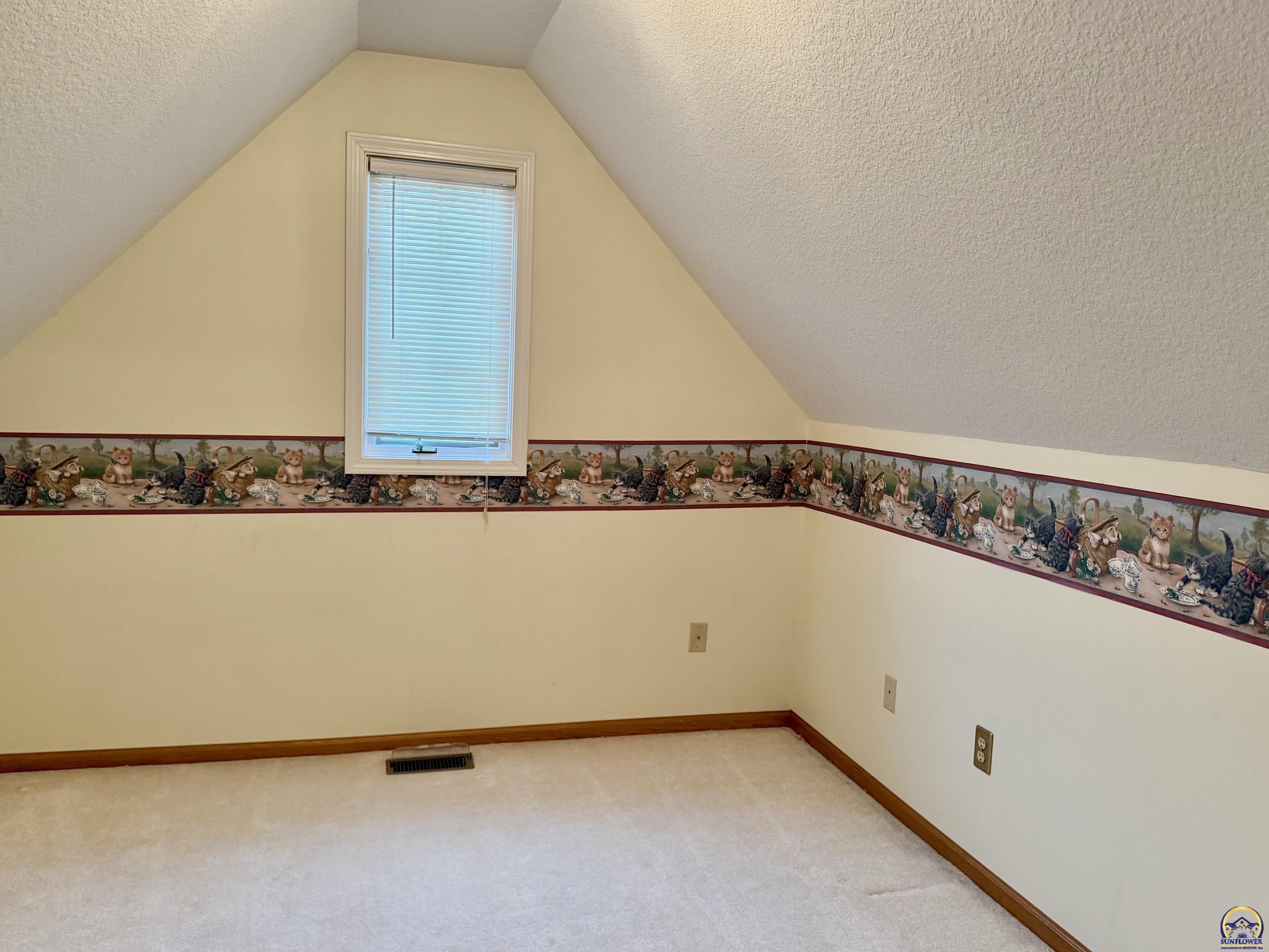 2027 Southwest West Trail Road Topeka, KS 66615 - Photo 38 of 56 Playroom attached to bedroom 3.