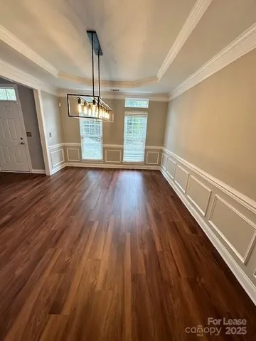a bathroom with a sink a mirror and a shower