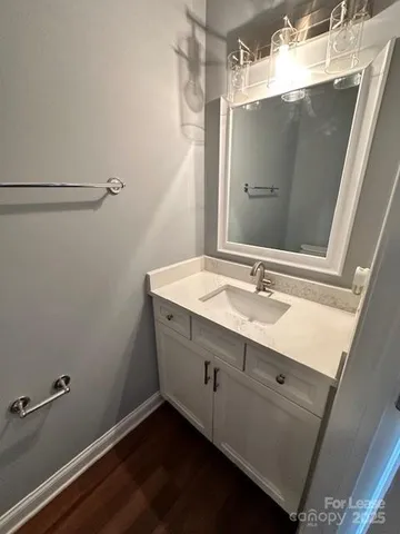 a bathroom with a toilet and a sink