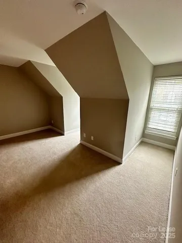 a bathroom with a sink mirror toilet and shower