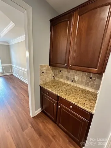 a view of kitchen with furniture and a table