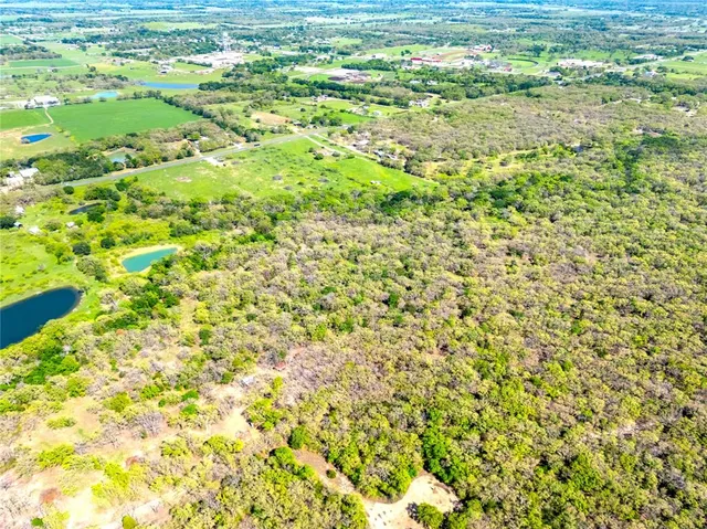 a view of a yard with an outdoor space
