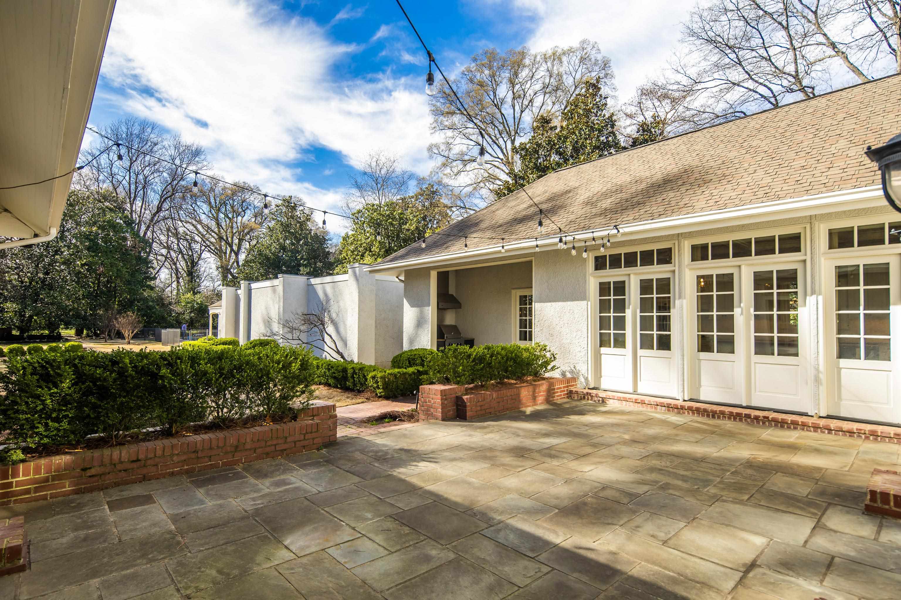 505 Goodwyn Street Memphis, TN 38111 - Photo 31 of 40 a front view of a house with a garden