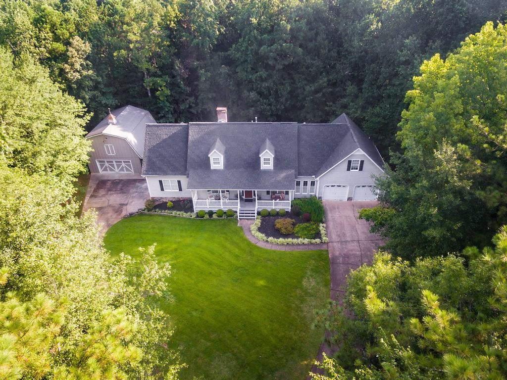 Gorgeous 3 acre estate in PRIME location with Alpharetta address and minutes from Hwy 9 and GA 400. This property is a total gem!