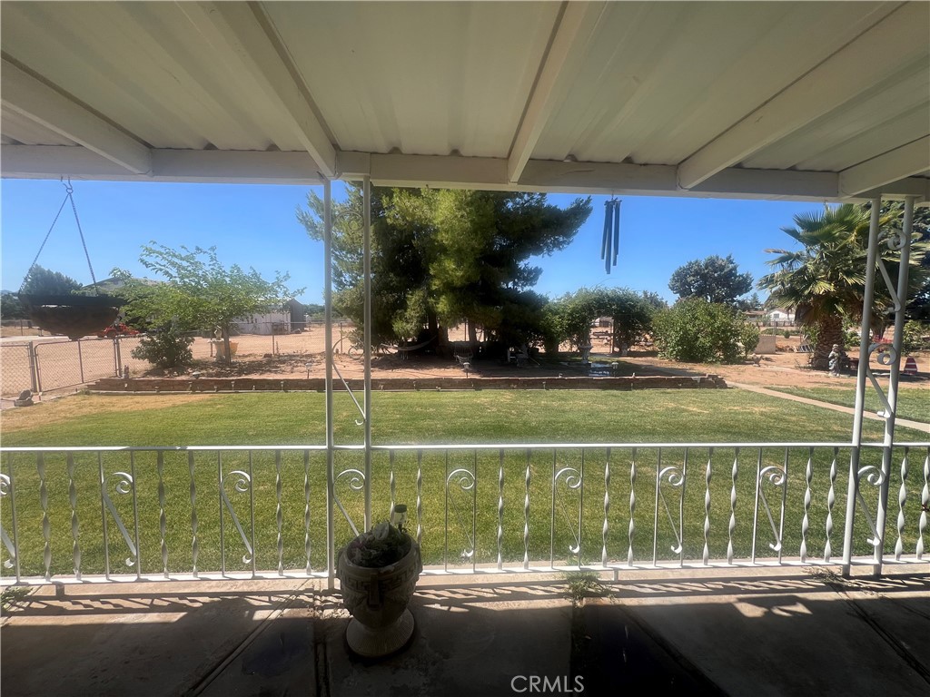 15411 Ash Street Hesperia, CA 92345 - Photo 3 of 11 a view of a house with a yard