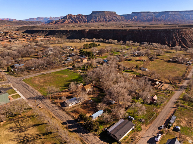 83 West 100 South Virgin, UT 84779 - Photo 35 of 35 Aerial overview of property's location with a mountain backdrop and rural landscape
