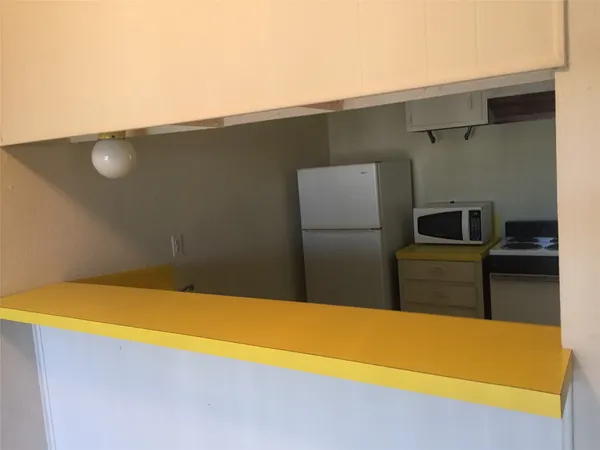 a bathroom with a toilet a sink and bathtub
