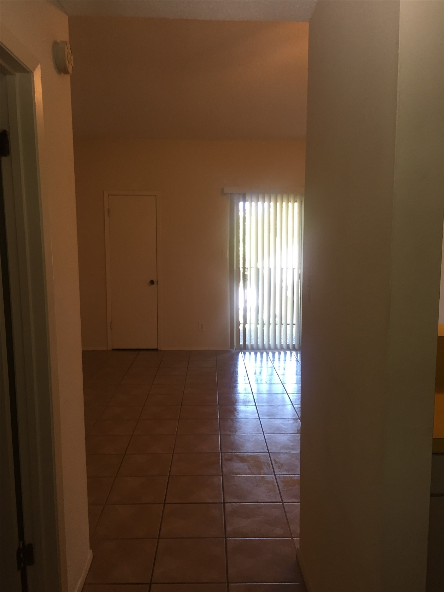630 Maiden Lane, Unit H Austin, TX 78705 - Photo 8 of 8 Hall with tile patterned floors
