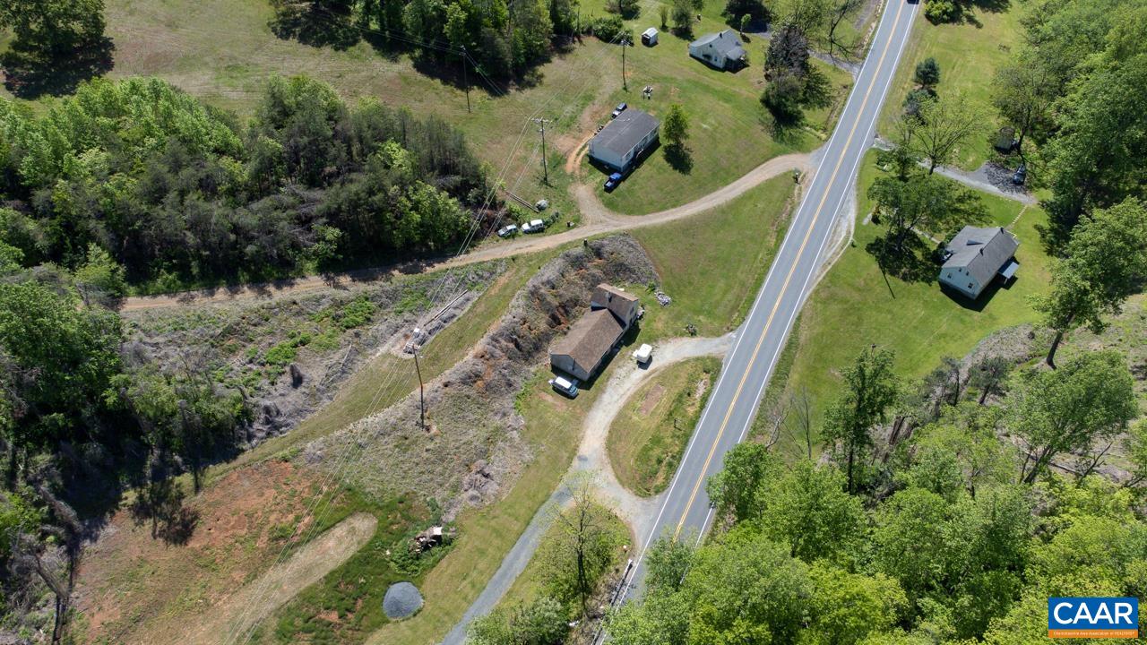1890 River Road Faber, VA 22938 - Photo 6 of 17 an aerial view of a house with a yard and greenery