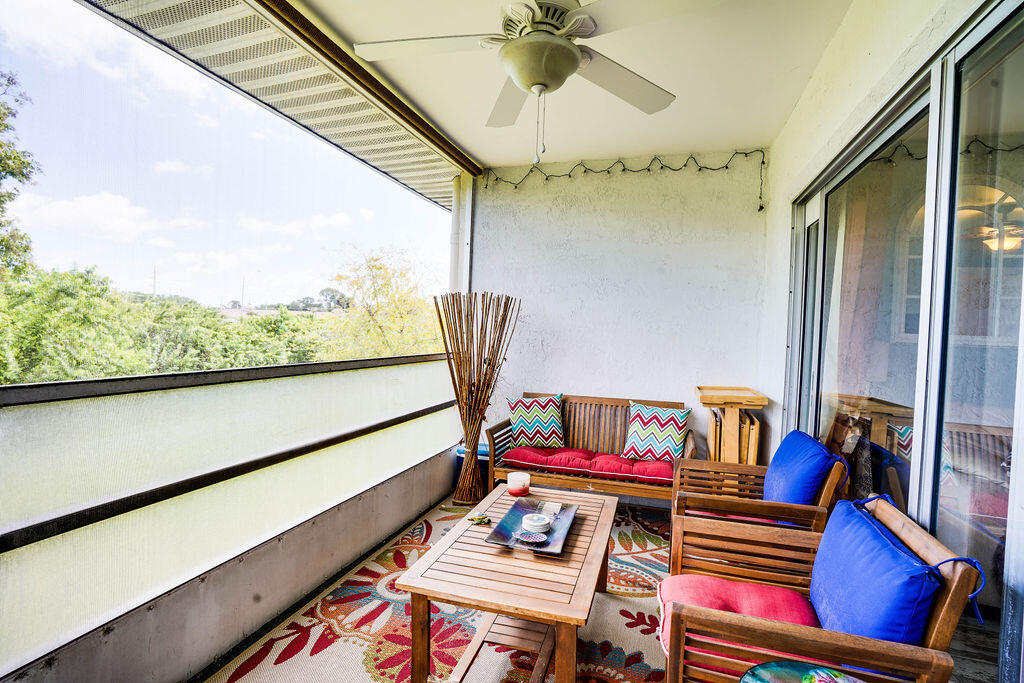 1900 South Kanner Highway, Unit 9206 Stuart, FL 34994 - Photo 13 of 23 a living room with furniture and a window