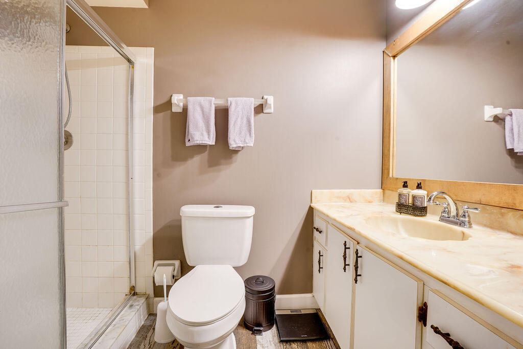 1900 South Kanner Highway, Unit 9206 Stuart, FL 34994 - Photo 19 of 23 a bathroom with a toilet sink and mirror