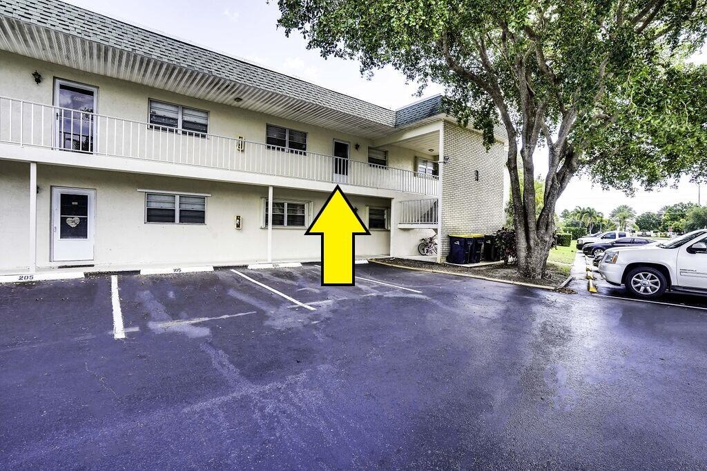 1900 South Kanner Highway, Unit 9206 Stuart, FL 34994 - Photo 21 of 23 a view of a house with a patio and a fire pit