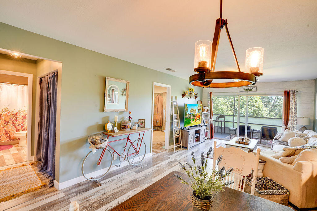 1900 South Kanner Highway, Unit 9206 Stuart, FL 34994 - Photo 7 of 23 a view of a dining room with furniture water view and large windows
