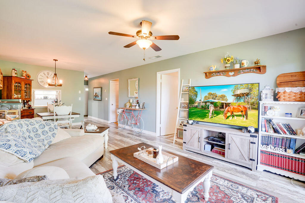 1900 South Kanner Highway, Unit 9206 Stuart, FL 34994 - Photo 8 of 23 a living room with furniture and a flat screen tv