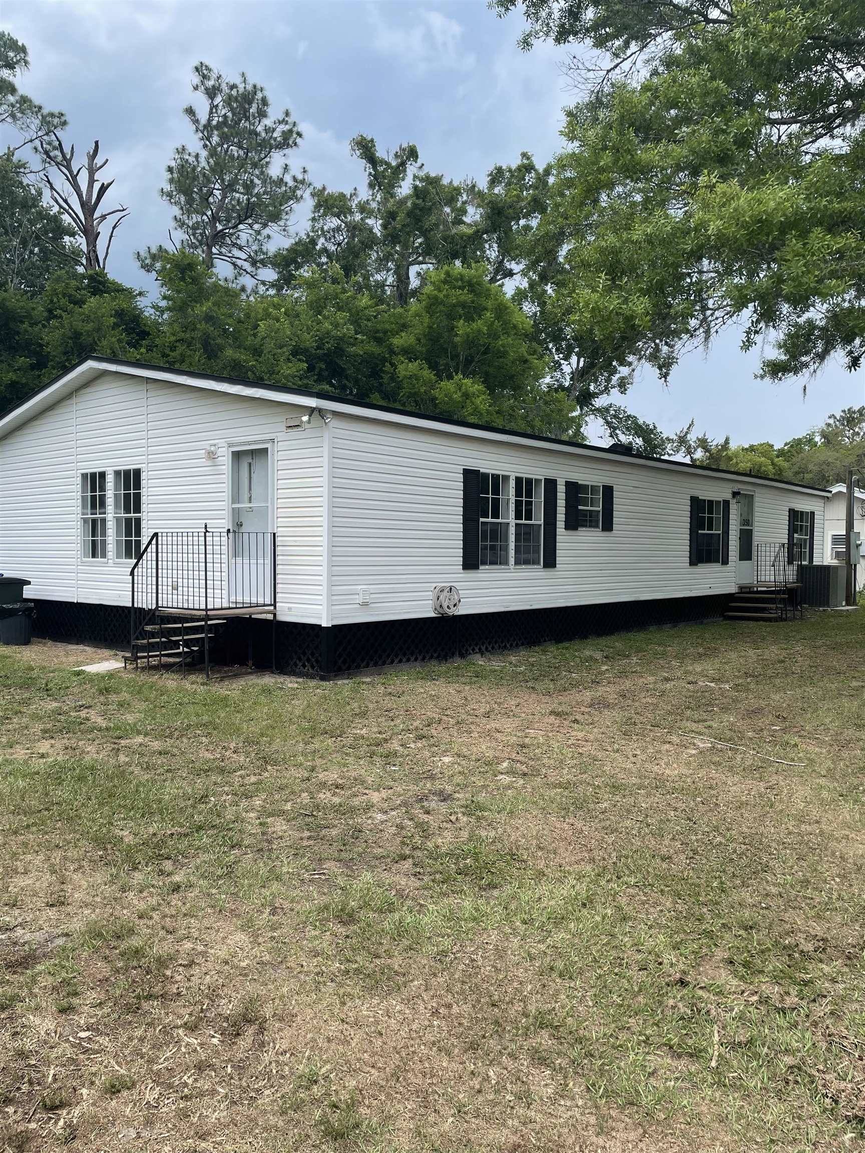 a view of a house with a swimming pool