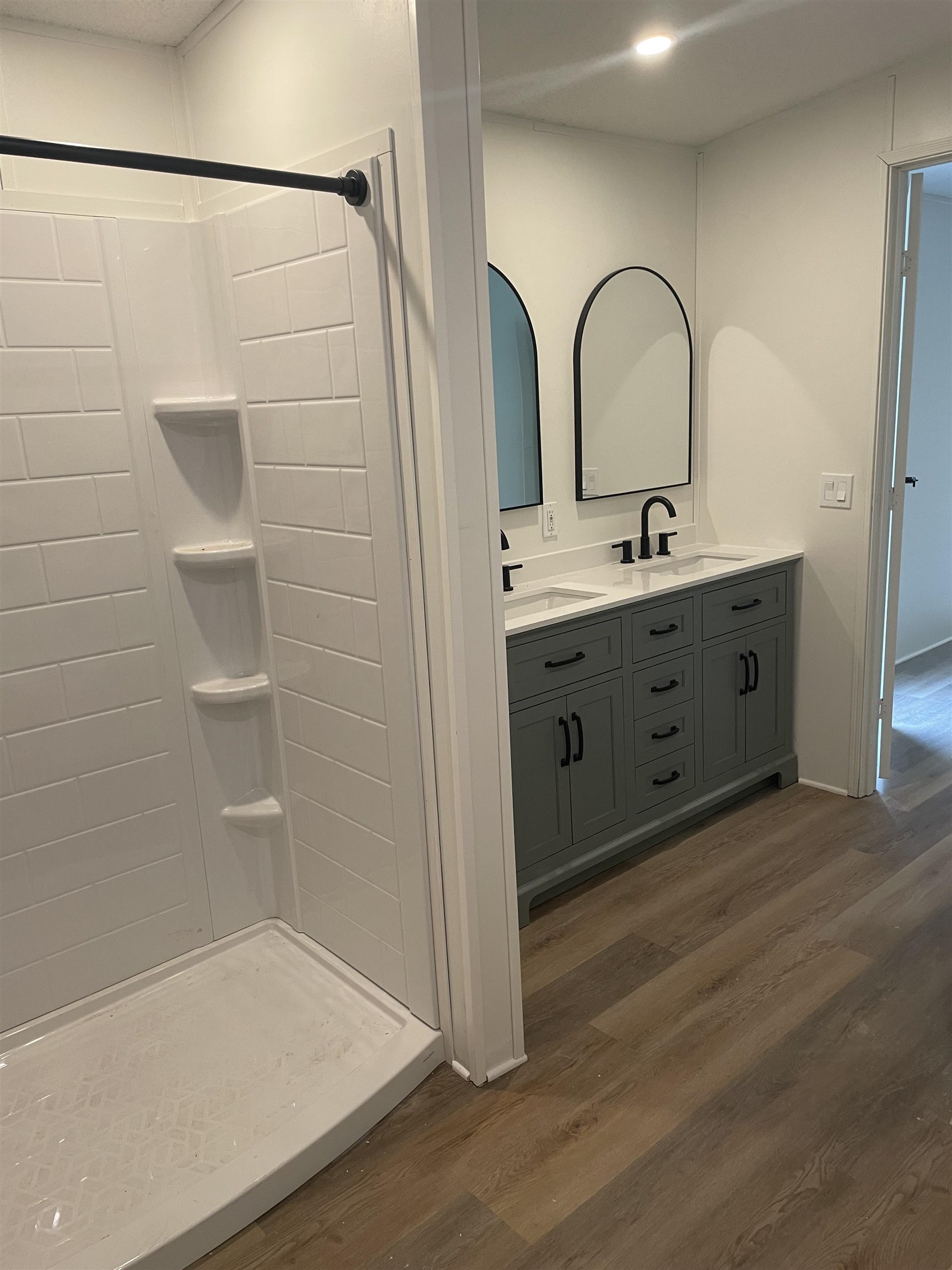 350 Varella Avenue St. Augustine, FL 32084 - Photo 11 of 17 a bathroom with a sink and a shower