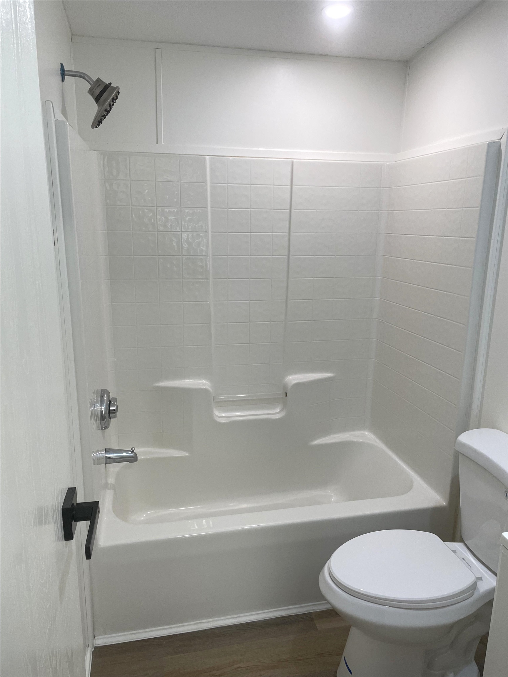 350 Varella Avenue St. Augustine, FL 32084 - Photo 15 of 17 a bathroom with a toilet and a bathtub