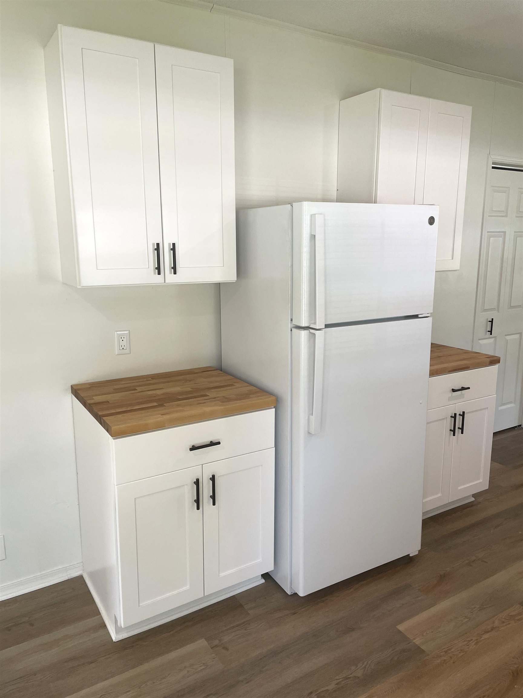 350 Varella Avenue St. Augustine, FL 32084 - Photo 6 of 17 a white refrigerator freezer sitting inside of a kitchen