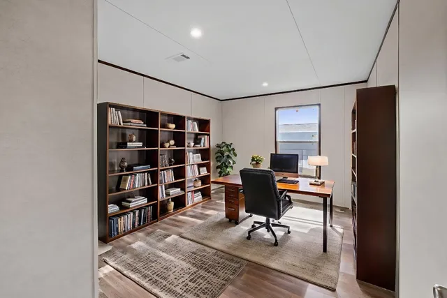 a view of a workspace with furniture