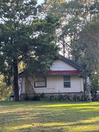 a view of a house with a swimming pool