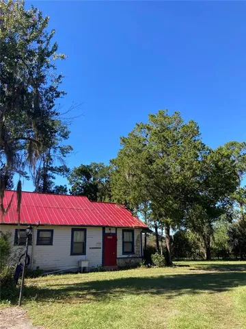 a view of a house with swimming pool