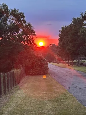 a view of road with yard