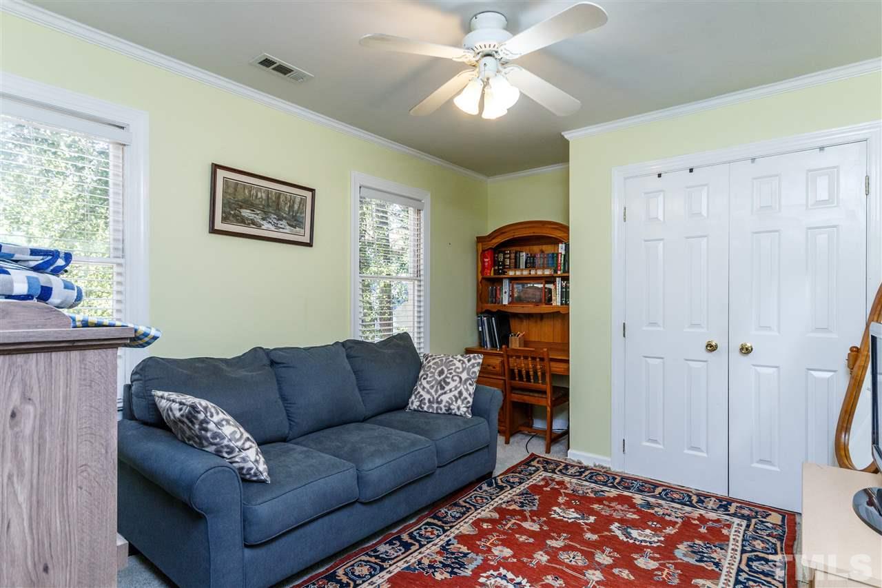 4500 Rutland Court Raleigh, NC 27613 - Photo 12 of 23 a living room with furniture and a window