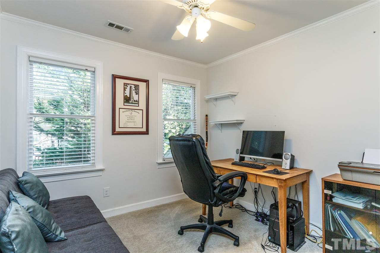 4500 Rutland Court Raleigh, NC 27613 - Photo 19 of 23 a view of a workspace with furniture and a window