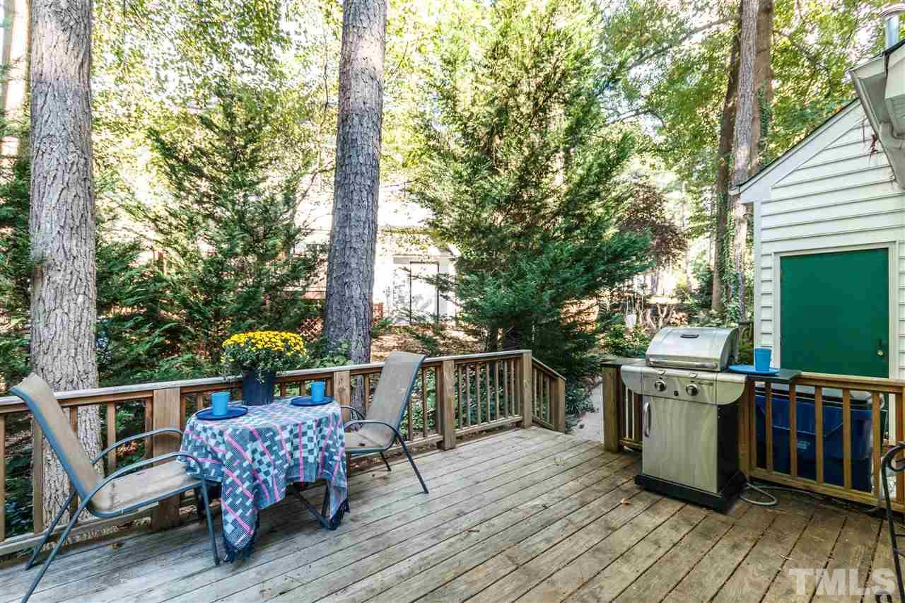 4500 Rutland Court Raleigh, NC 27613 - Photo 22 of 23 a deck with hardwood table and chairs